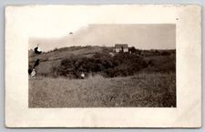 RPPC House on the Hill Child in The Field Postcard D23