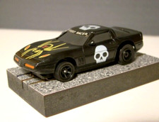 84 BLACK CORVETTE - BULLDOG / FAST  FUN HUGS THE TRACK 