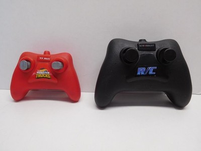 Lot of 2 New Bright Remote Controls RC 2.4GHz (Black) & HW Monster (Red) DAMAGED
