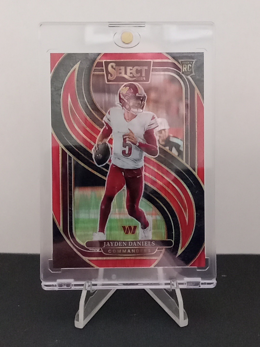 2024 Panini Select Premier Level Jayden Daniels Red Shock Prizm 187/249 (RC)