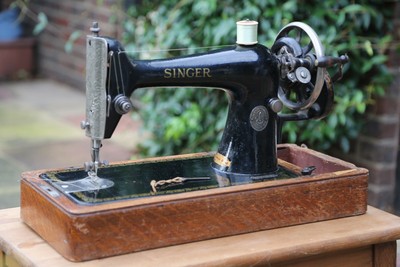 antique singer sewing machine in case