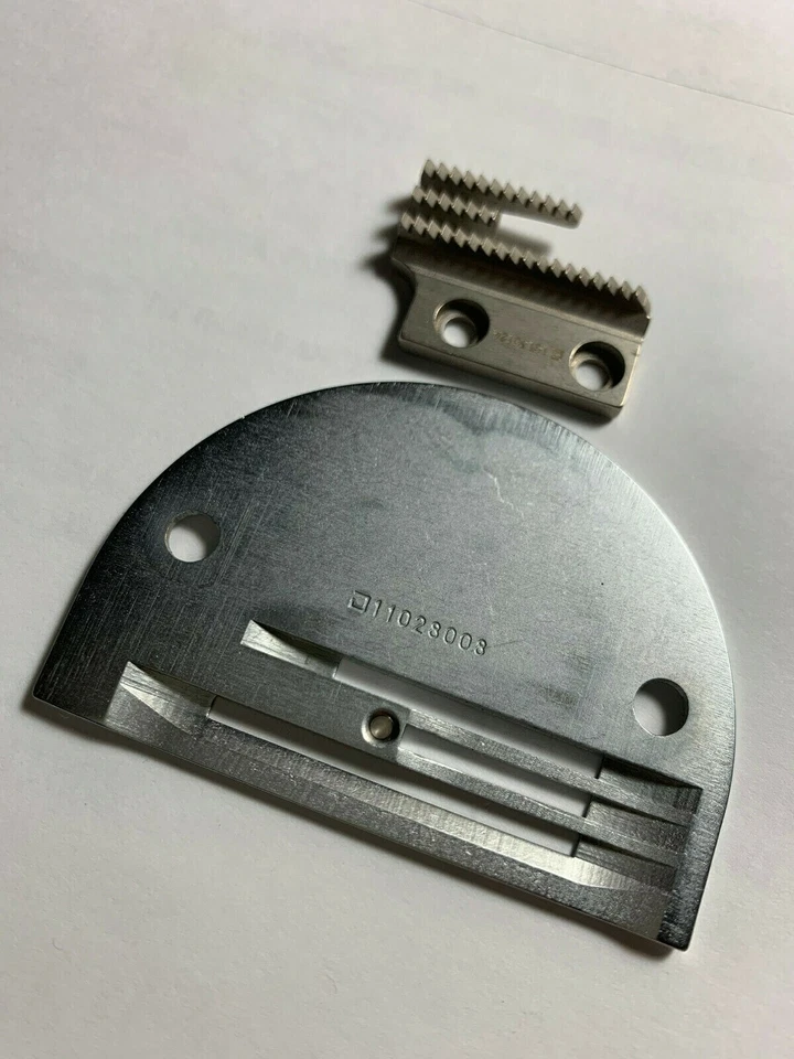 Placa de aguja y alimentación genuina JUKI para perro se adapta a JUKI DDL-5550 y más. Foto 3 de 4