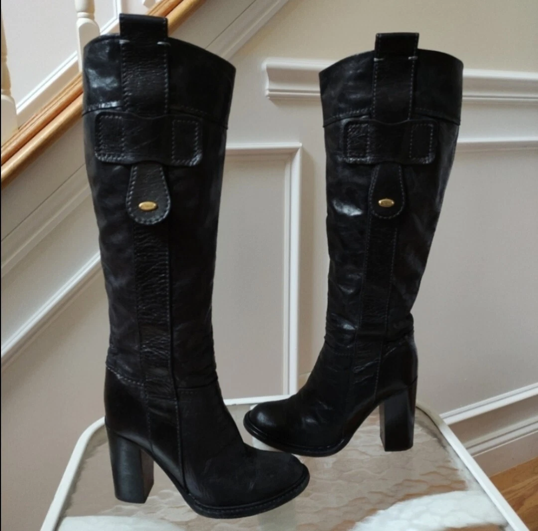 Knee length top heeled boots