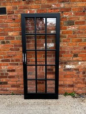 Solid Wood Internal Door Painted Black Partially Glazed With Perspex