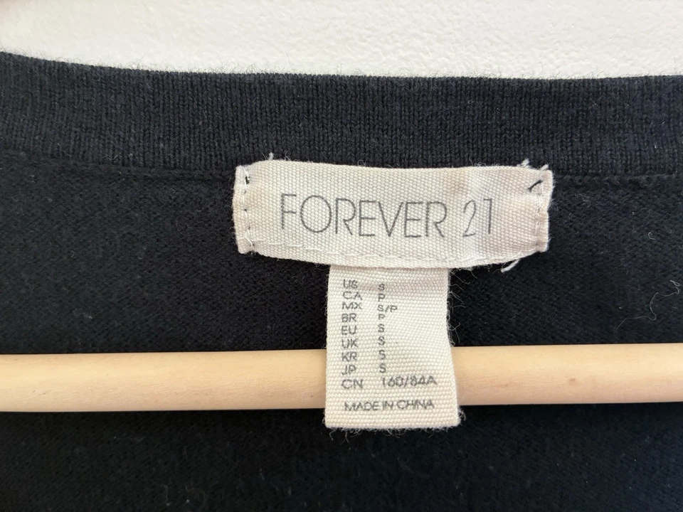 Cárdigan de manga larga Forever 21 negro liso de algodón transparente con botones delanteros S Foto 2 de 4