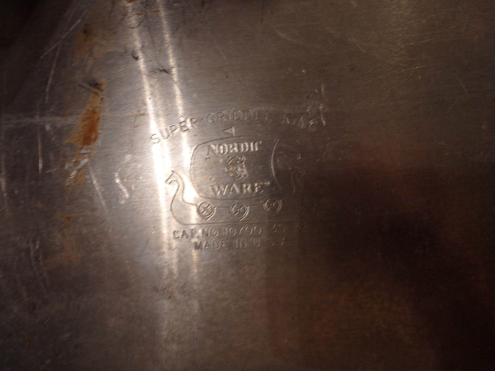 8M-COLEMAN 2 burner propane camping stove with a NORDIC ware griddle