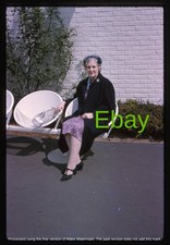 Original Slide - Woman Sitting on Outside Seat at 1964 New York World's Fair