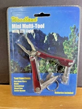 NEW SEALED Woodland Mini Multi Tool w/LED Light "5 functions"