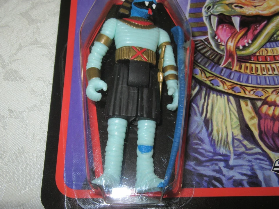 Figura de acción Super7 ReAction The Worst Snake Tut cara azul Foto 3 de 4