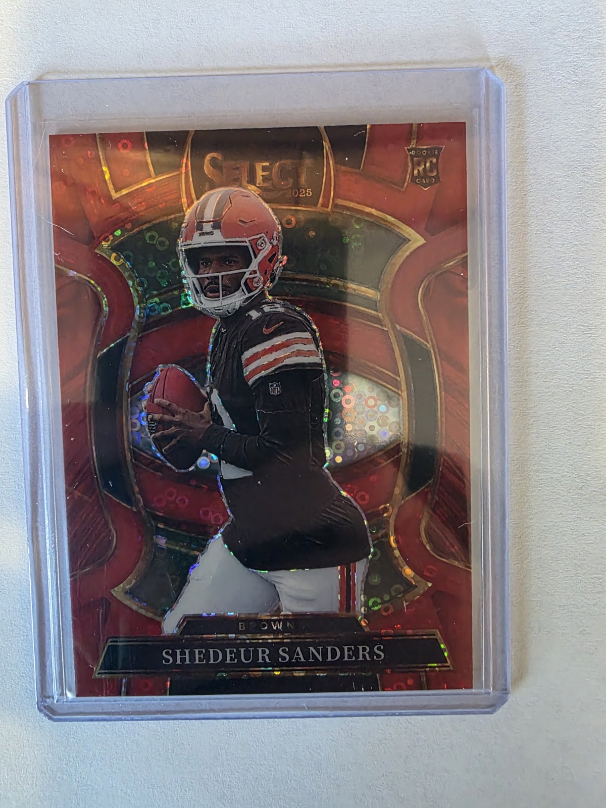 2025 Panini Select Shedeur Sanders Red Disco Concourse Level /49 Browns