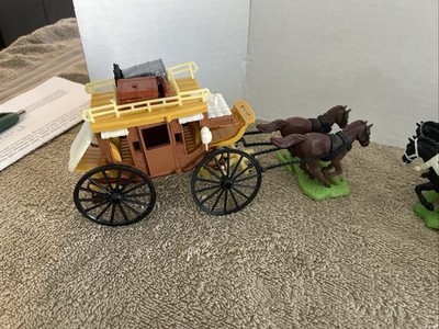 2 Vintage Processed Plastic Wells Fargo Wagons