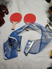 portable table tennis set featuring a retractable net and two paddles.Penn Brand