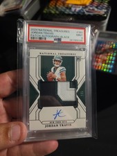 2024 National Treasures Jordan Travis RC Rookie Patch Auto On Card black /5. rookie card picture