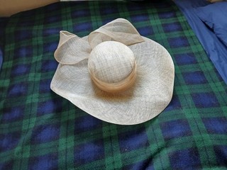 Elegant large cream wedding hat one size worn once overall width 50cm