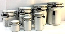 OGGI 7-Piece White Ceramic Airtight Locking Canister Set 4 with Scoops