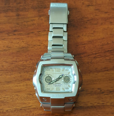 Casio G-SHOCK G-011D Quarz Analog/Digital Metall silber Stoßfest Alarm