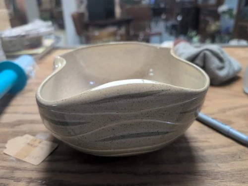 Red Wing Pottery bowl, featuring a speckled tan and green glaze