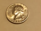 1945-s uncirculated silver Washington quarter.