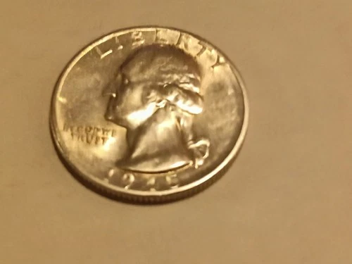1945-s uncirculated silver Washington quarter.