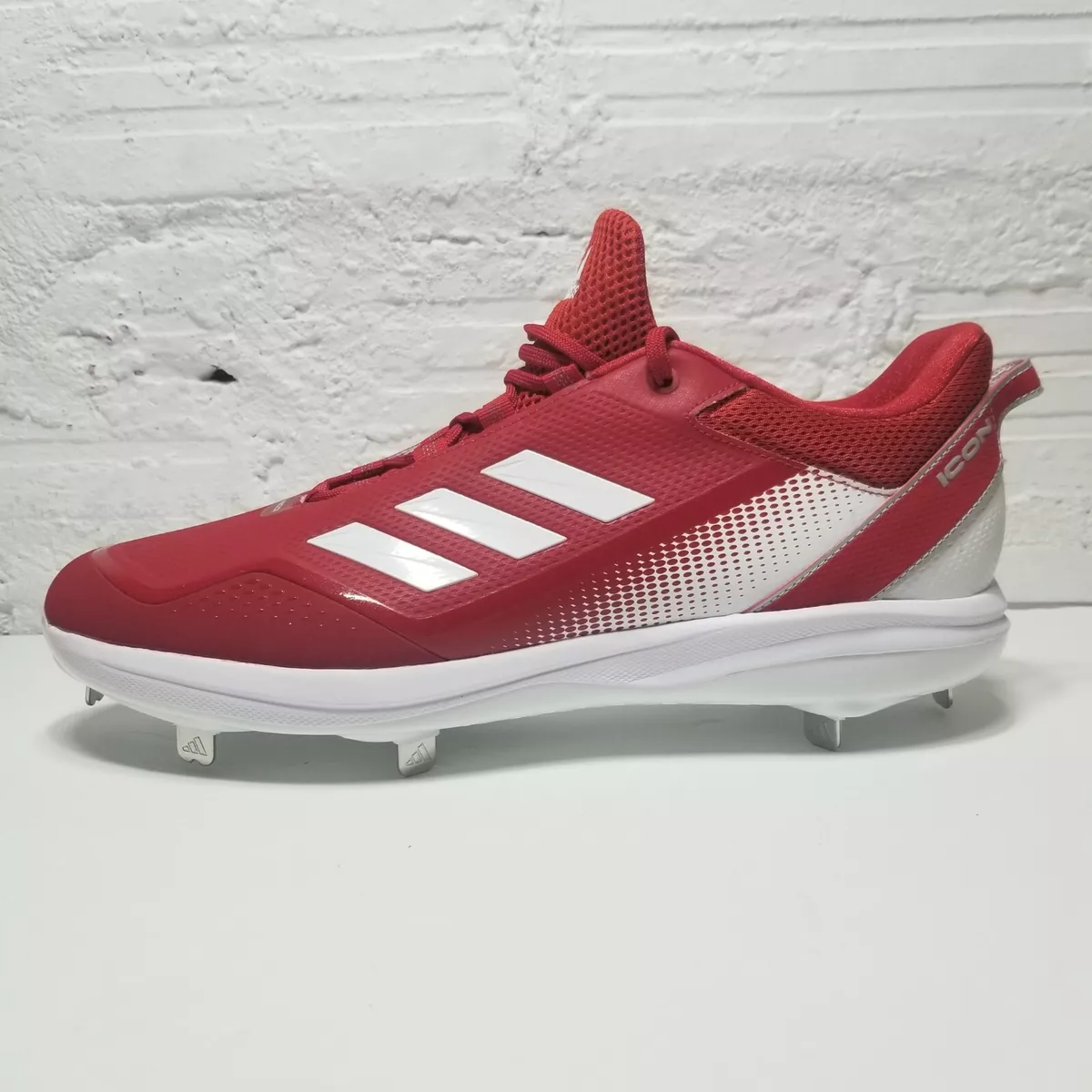 red and white adidas baseball cleats