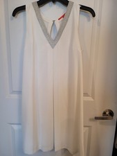 Elegant, wedding or party, white sleeveless v-neckline dress for women