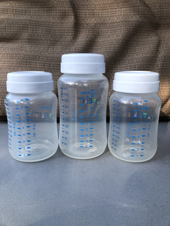 Lote de botellas Avent. (3) Botellas de 9 OZ y (1) Botella de 11 OZ. (5) Pezones nuevos. (1) Tapa Foto 3 de 4