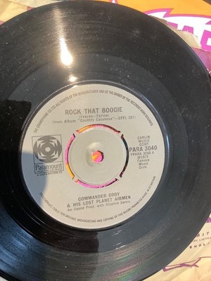 Commander Cody & The Lost Planet Airmen.  Rock that Boogie.   7  vinyl.   1973