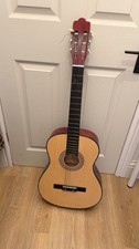 Acoustic Guitar With Broken String And Marks