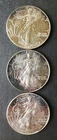 1987, 1994, and 2011 $1 American Silver Eagle Dollars