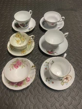 Assorted set of six Bone China cups and saucers with various floral patterns