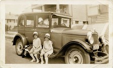 TWO GIRLS, SISTERS IN MATCHING DRESSES POSING BY CAR & ANTIQUE SNAPSHOT PHOTO