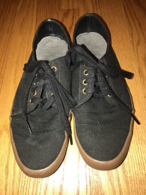 black vans gold eyelets
