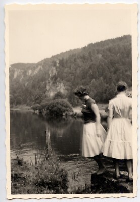 Portrait of 2 women by the water - old photo year. 1950