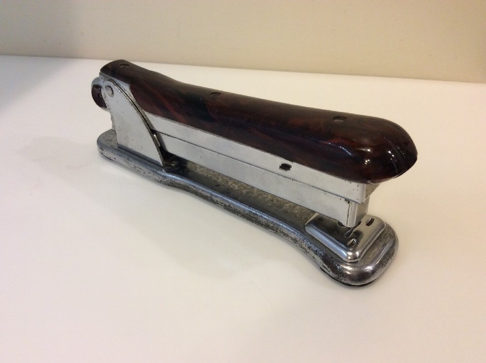 A pristine chrome ACE 502 Liner — clean, architectural, and substantial enough to anchor any desk as a functional art piece.