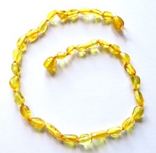 Genuine 100% natural Baltic amber necklace, knotted, bean shape beads