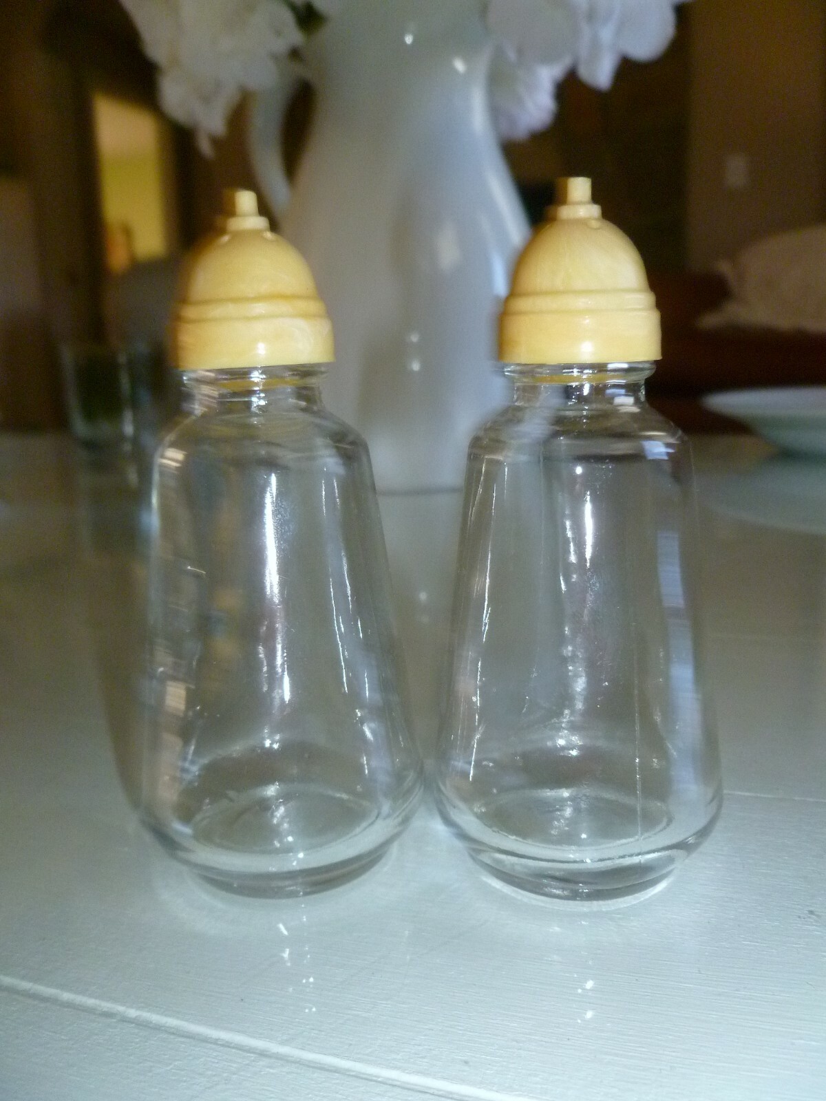 Vintage Glass Salt and Pepper Shakers With Plastic/Celluloid? Tops