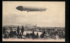Ansichtskarte Zeppelin-Luftschiff über einer Stadt 