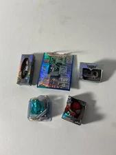 Various collectable figurines and toy story shopping bag Mini brands