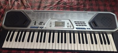 Casio CTK-2400 61-key Portable Arranger 100 Song Bank Electronic Keyboard Piano