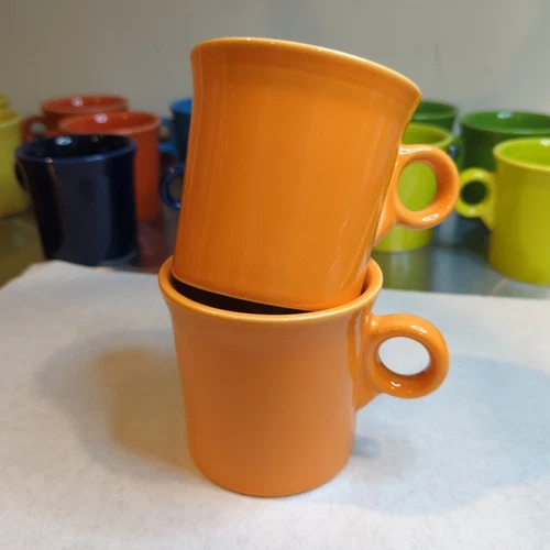 2 Fiestaware Mugs Ring Handle TANGERINE Orange Coffee Cup HLC USA 3 1/2 inch