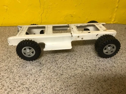 Tonka 1959 Tow Truck Frame and Tires Only Very nice Tires and hubcaps Clean