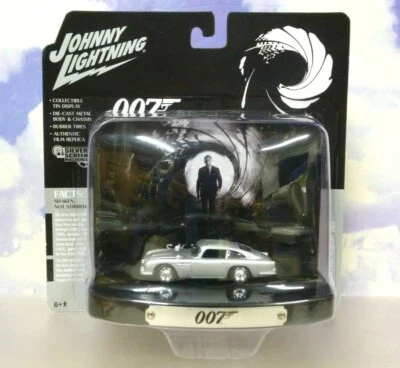 JOHNNY LIGHTNING 1/64 JAMES BONDS ASTON MARTIN DB5 "SKYFALL" TIN DIORAMA DISPLAY - Image 1 of 2