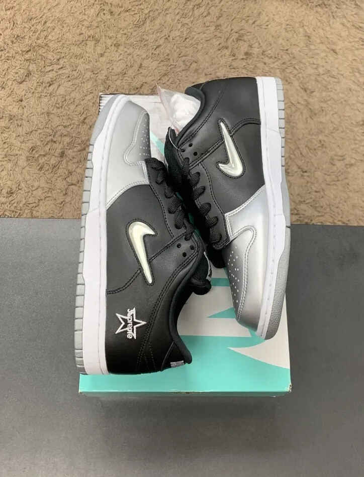 nike sb dunk low supreme jewel swoosh silver