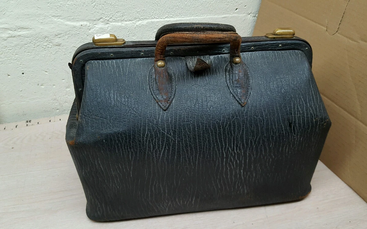 A black leather doctor's bag, circa 1911.