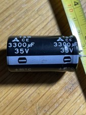 A lot of TWO 2 TSW Electrolytic SNAP-ON lead capacitors 3300 uf, 35 V, 85 C