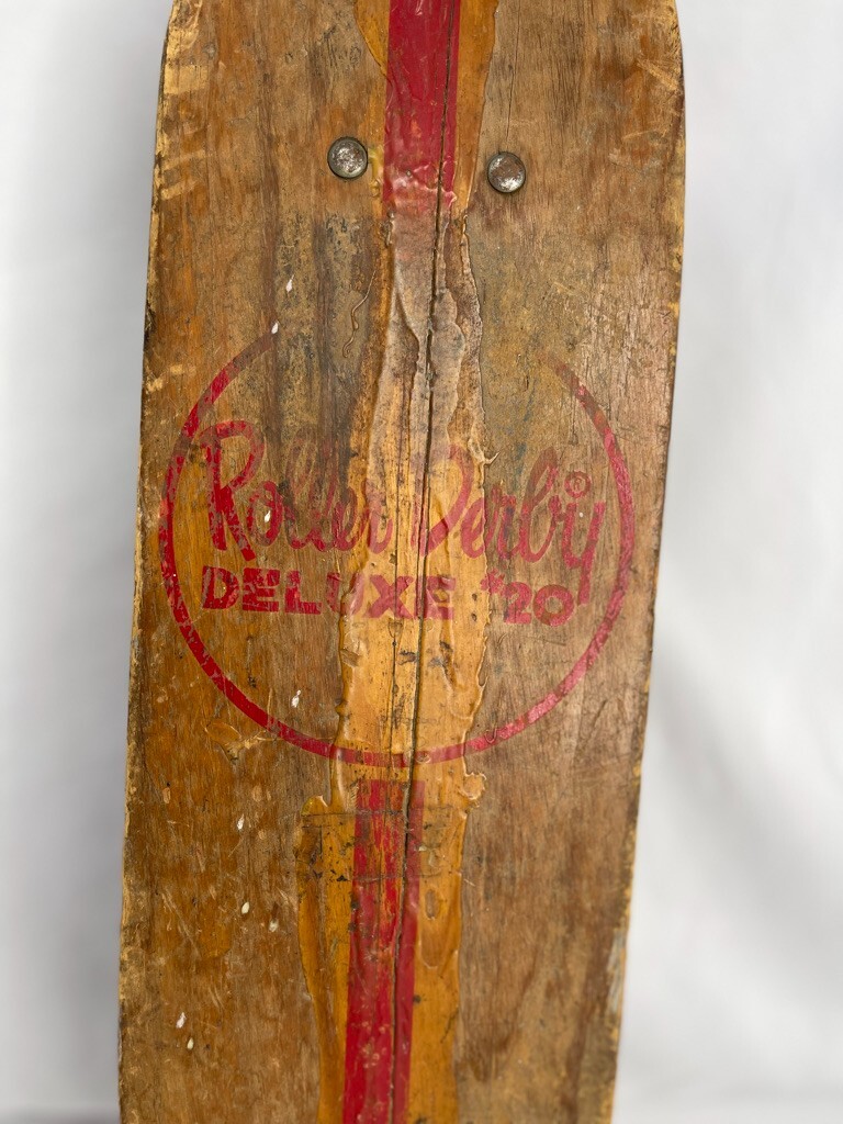 1960's Roller Derby Deluxe #20 Wooden Skateboard with Red Clay