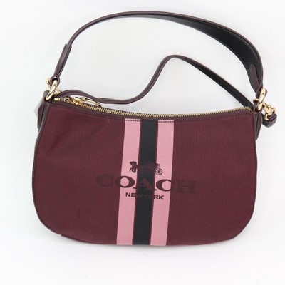 coach horse and carriage jacquard sutton crossbody