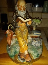 Capodimonte by Milio Figure Old Man With Glasses reading a book on bench MI108