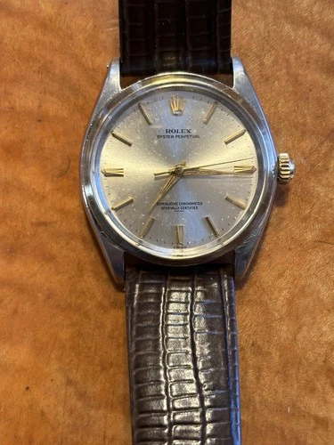 Vintage Steel Gold 34mm Rolex Oyster Perpetual 1002 Silver Dial 1560 movement