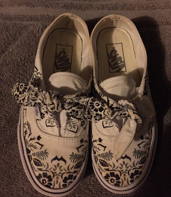 white slip on vans size 5